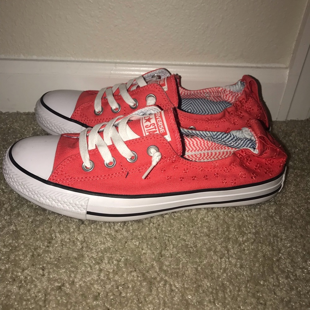 Salmon colored converse